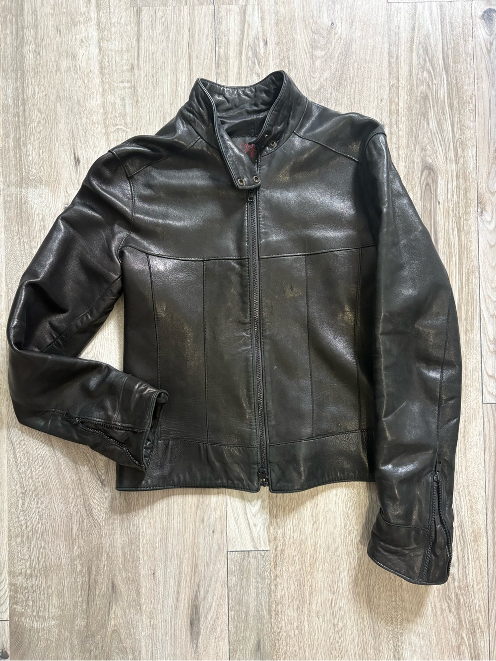 Women’s Oscar Leopold black leather jacket